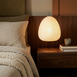 Kumo rice paper lamp on a walnut nightstand