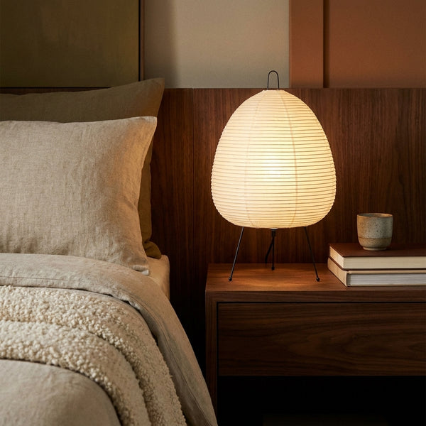 Kumo rice paper lamp on a walnut nightstand