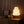 Yuki rice paper lamp on a walnut credenza beside a record player