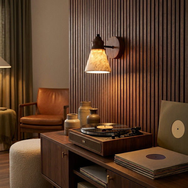 Terra sconce on a walnut slat wall