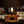 Vera Black in a warm mid century interior