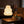 Yuki rice paper lamp on a side table with books