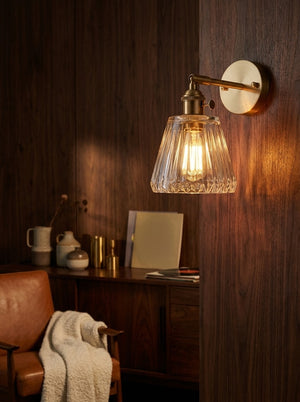 Aurelia brass and glass wall sconce, warm brass and clear glass