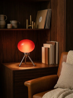 Bloom lamp on a walnut desk in a cozy room