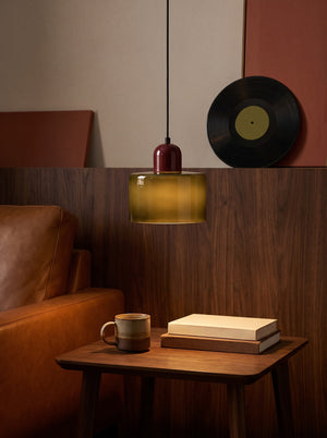 Juno pendant light above a side table