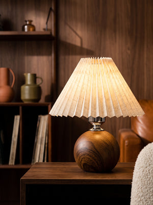 Mabel table lamp pleated shade glowing