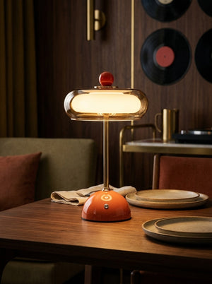 Nova cordless saucer lamp on a dining table